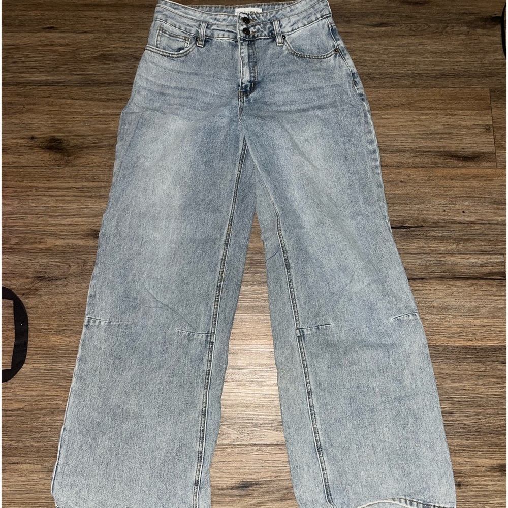 Mid rise light wash jeans size 7/s